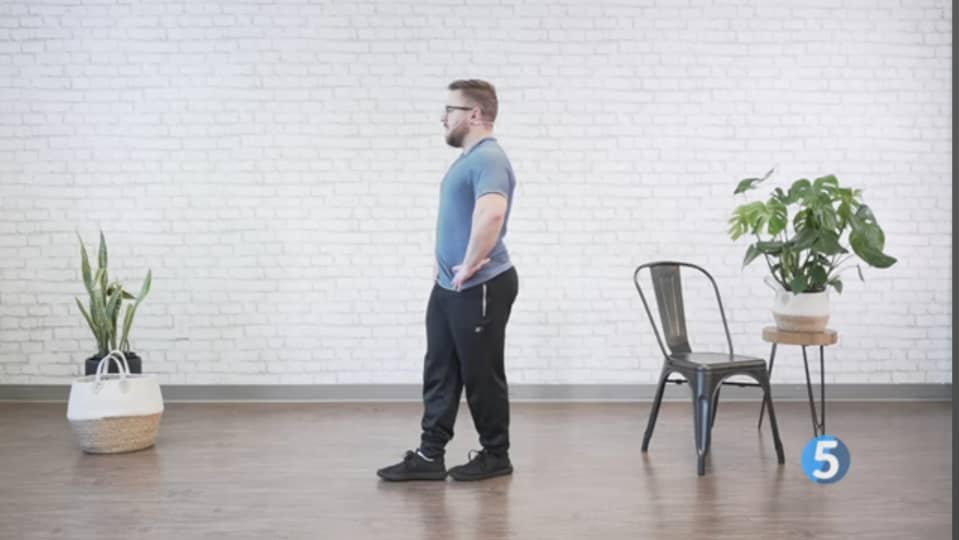 Man  practicing a heel-to-toe walk exercise, one of the 10 exercises to prevent falls.