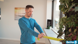 Standing row for senior's shoulder health starting position