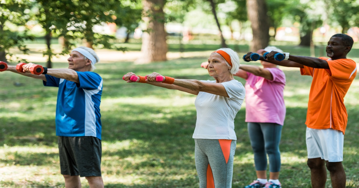 older adults doing dumbbell excercises