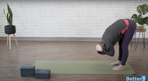 Forward fold with hands on head