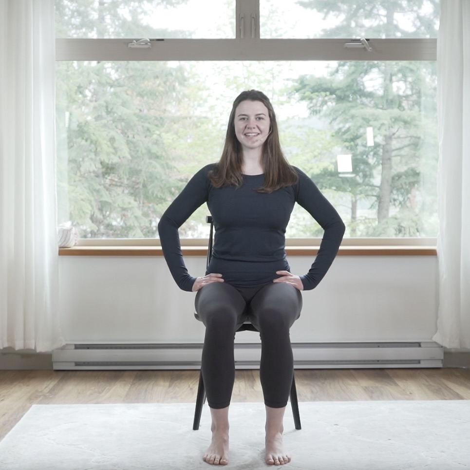 Sitting tall with feet flat is the starting position for seated marching, an exercise to improve circulation & leg strength.