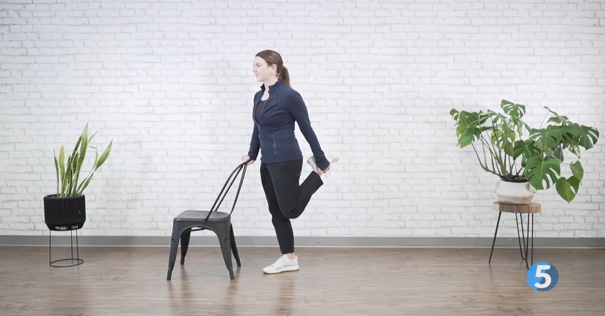 instructor doing indoor excercise for older adults