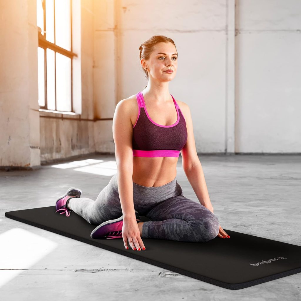 A young lady stretches atop a yoga mat, another must-have equipment for at-home senior workouts.