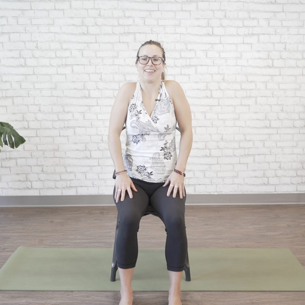 Shoulder rolls for senior's mobility pose 1