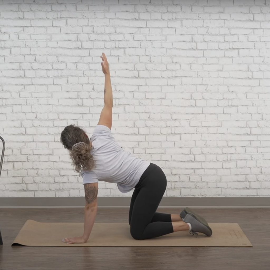 Reach through shoulder stretch