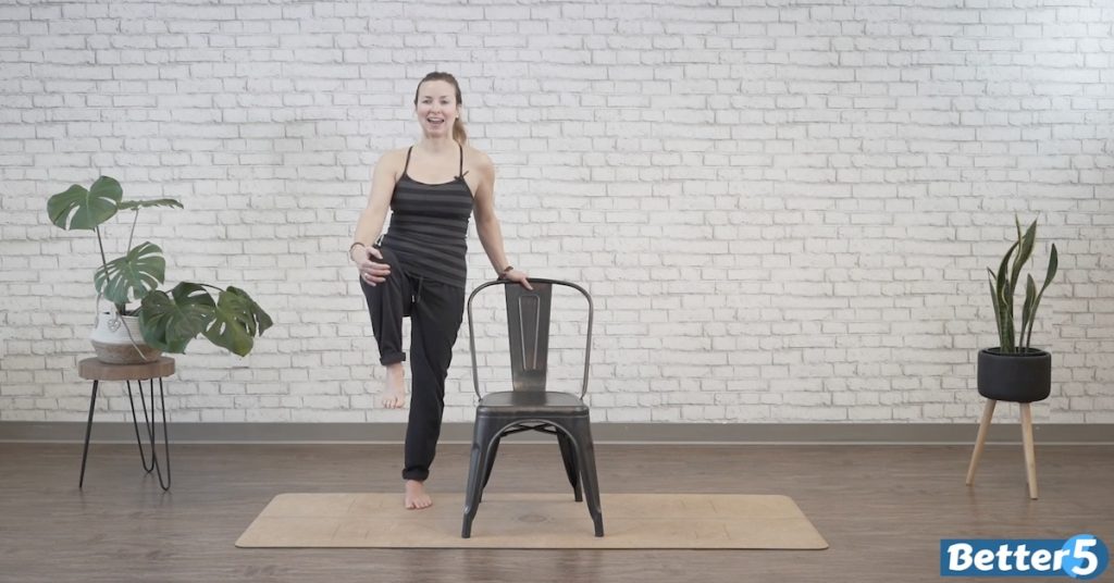 Instructor doing calf and leg stretches at home for seniors