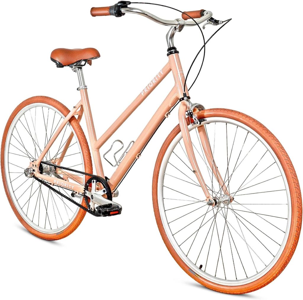 A peach-colored Priority cruiser bike, one of the easiest to maintain among the best bikes for seniors