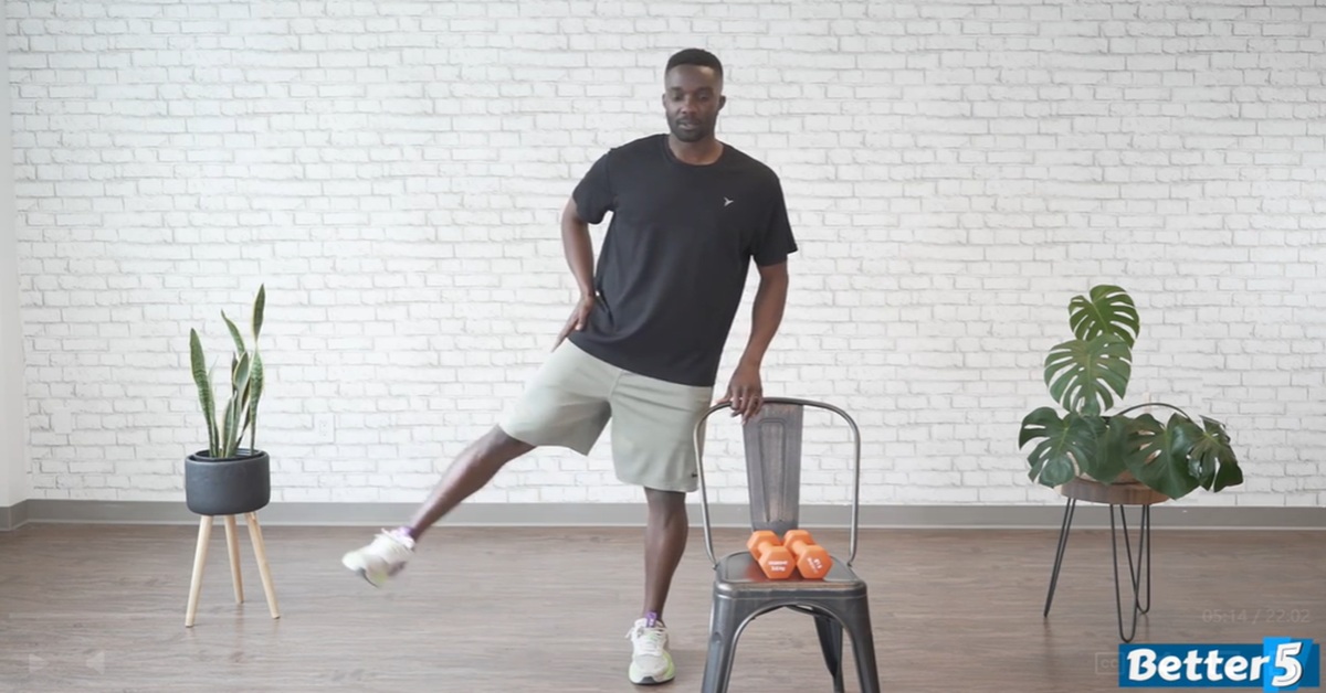 instructor doing standing calf raise