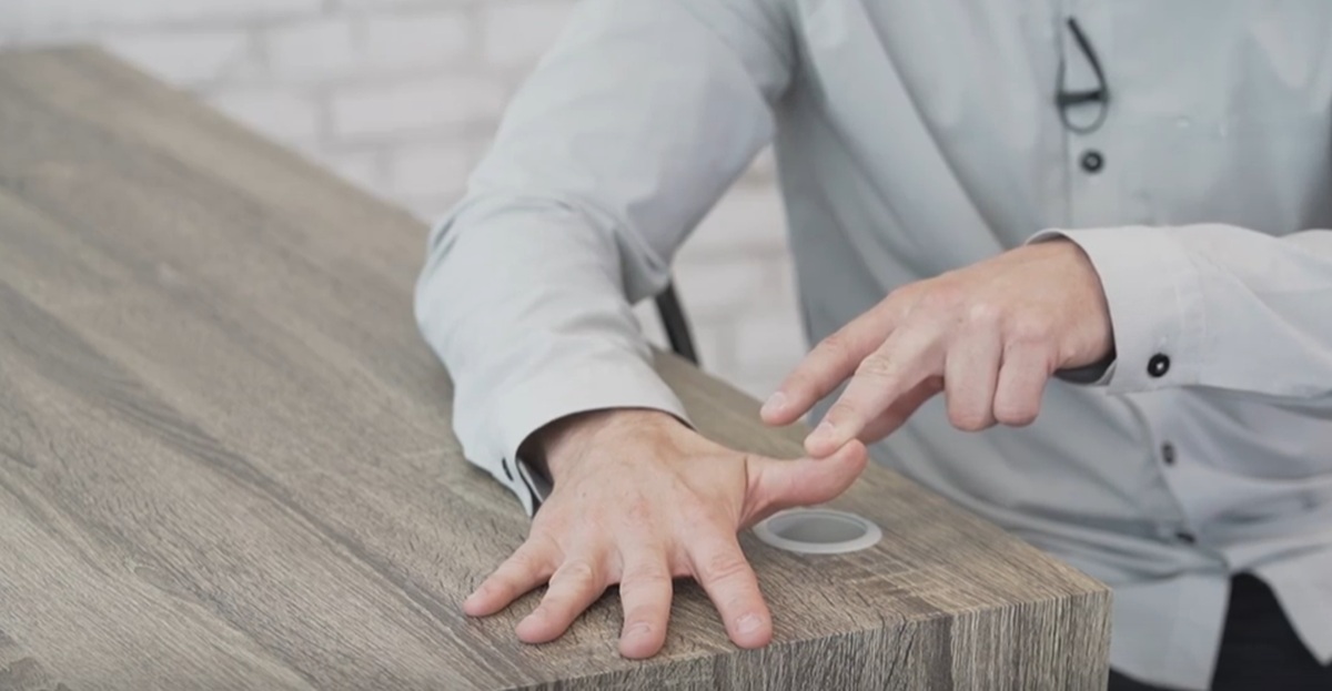 instructor doing hand strength excercises for seniors
