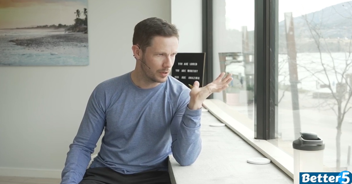 instructor doing wrist excercises for seniors